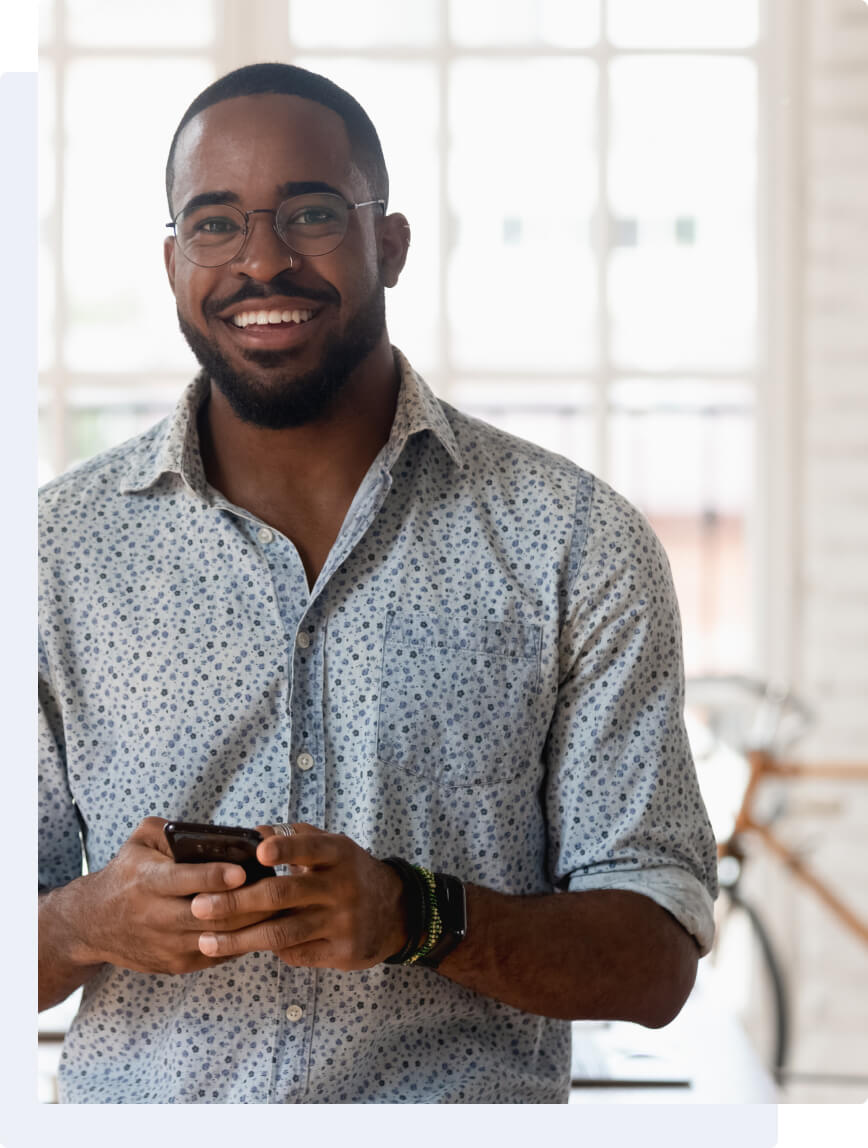 smiling-man-mobile-device